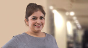 Smiling person to illustrate requirements for weight loss surgery